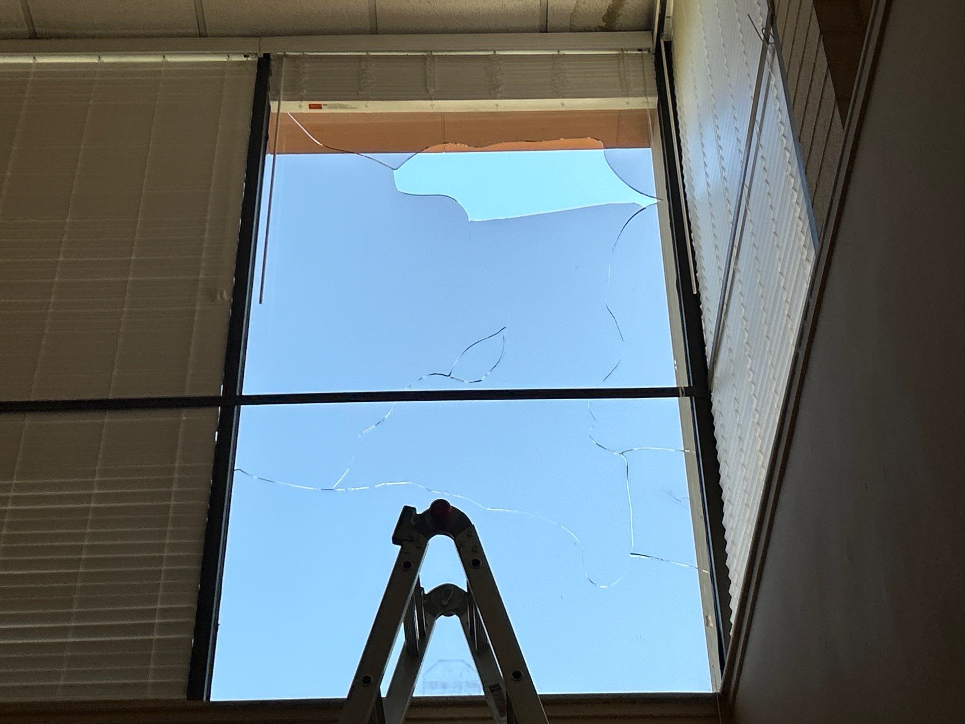 Heat Fractured Bronze Annealed Glass Replacement in Compton with New Tempered Bronze Glass